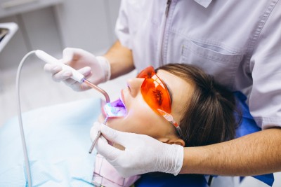 woman patient with dentist