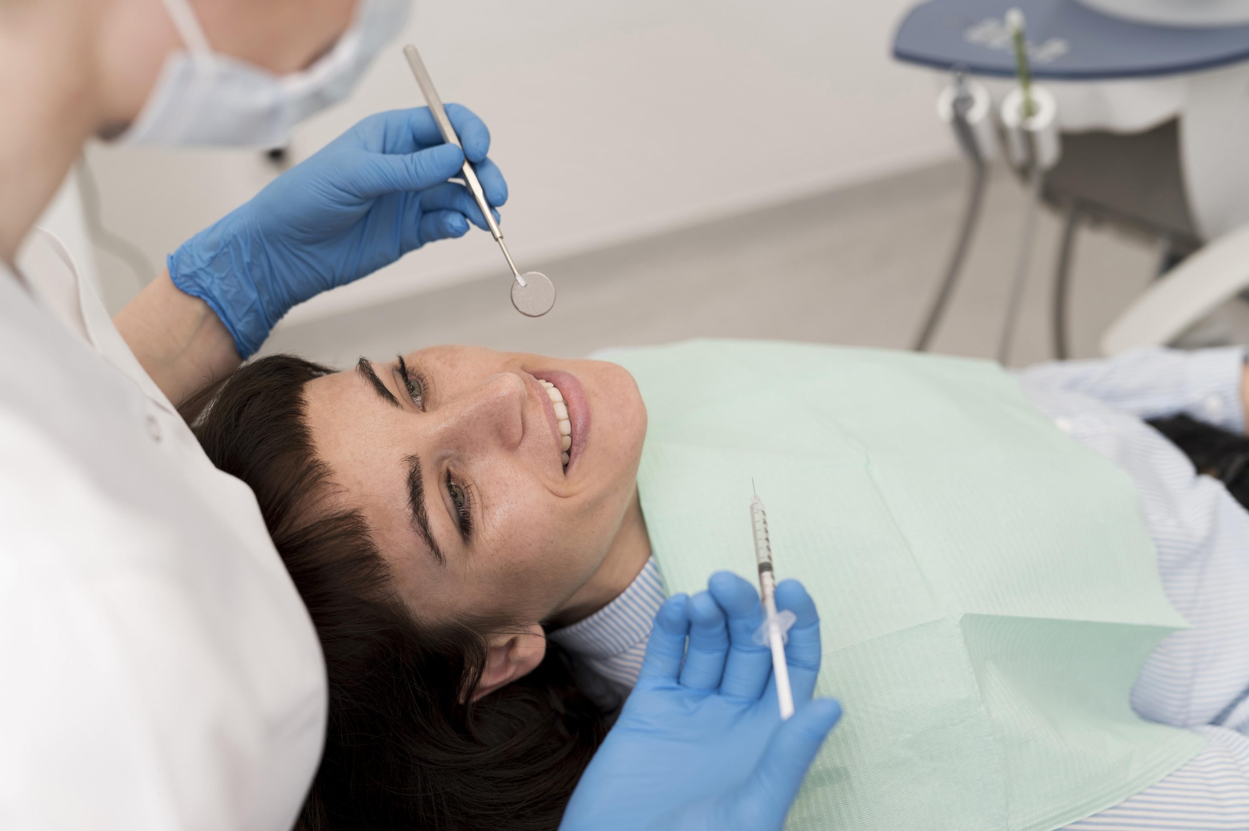 Female patient having a procedure done at the dentist